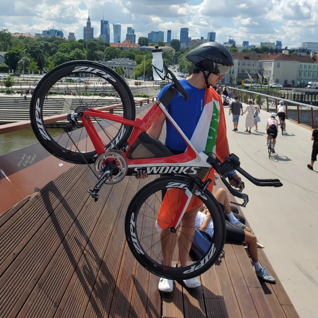 Toufic standing with the triathlon bike before IRONMAN 70.3 Warsaw